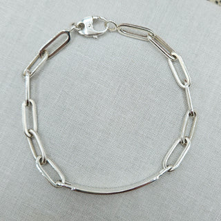 paperclip links on men's silver ID bracelet