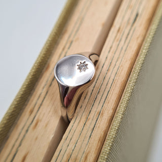 women's silver signet ring with star setting