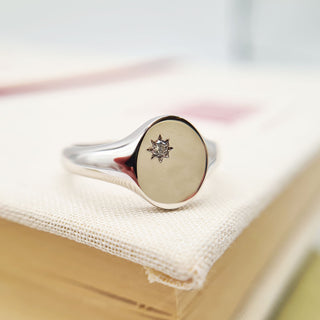 ladies signet ring set with gemstone