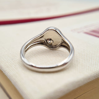 underside of ladies silver star signet ring