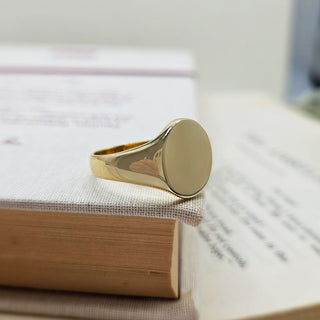 men's oval signet ring in 9ct yellow gold