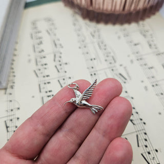 925 silver hummingbird in hand for scale