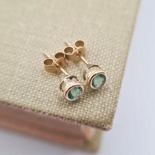 small emerald studs