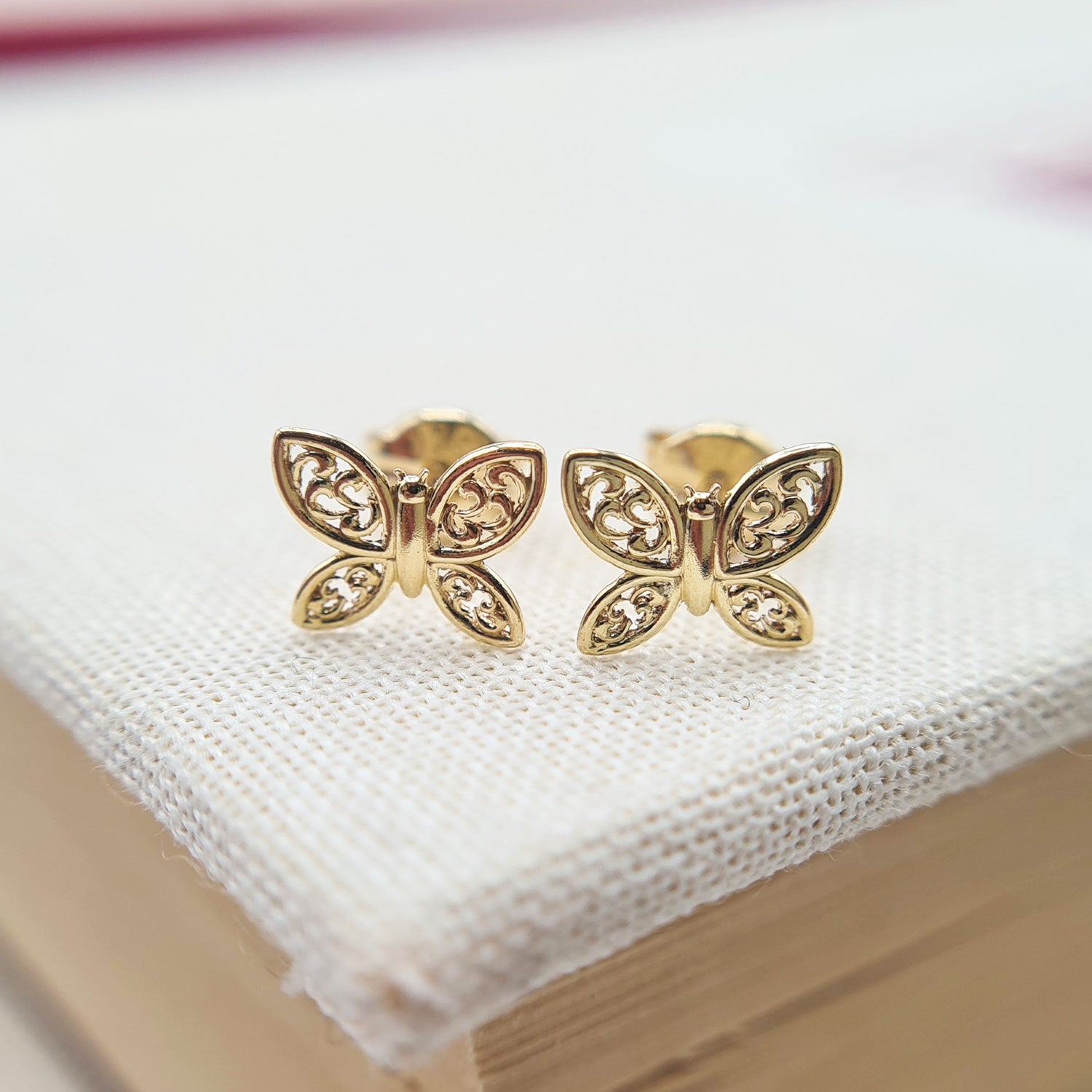 yellow gold butterfly stud earrings