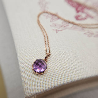 small amethyst charm in 9K rose gold