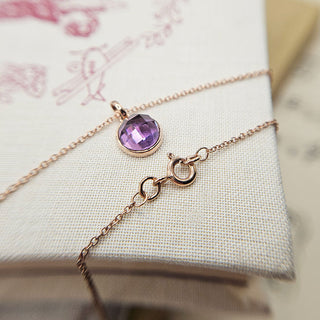 rose gold chain and amethyst pendant
