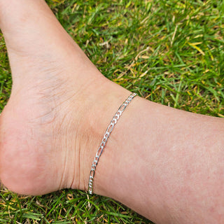 solid silver anklet bracelet being worn