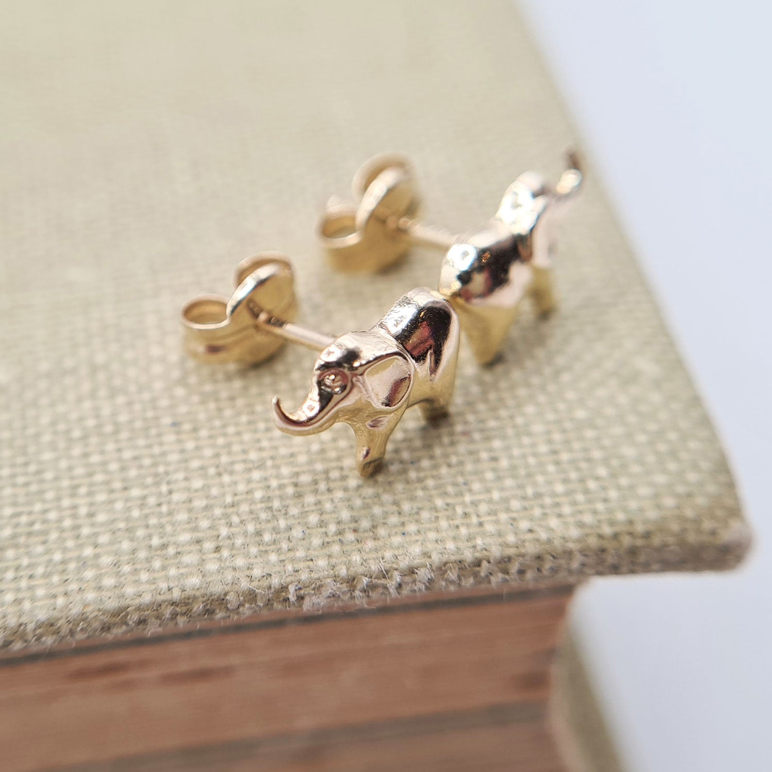 elephant studs secured by post and butterfly