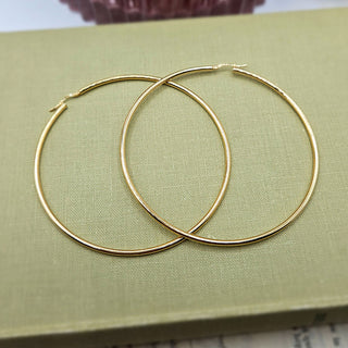 giant hoop earrings in yellow gold plated silver