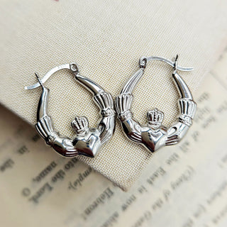 women's silver claddagh creole earrings