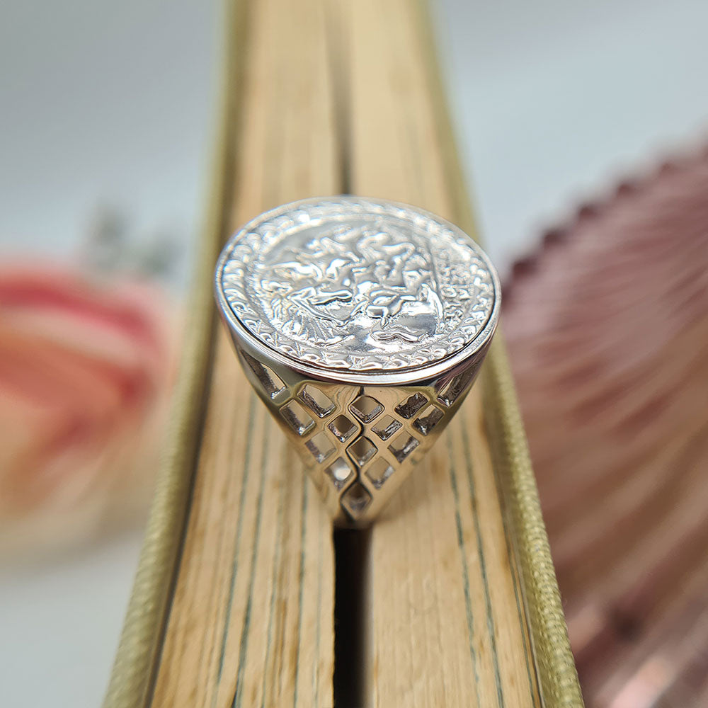 side profile of silver st george ring