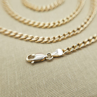 lobster clasp on solid gold close curb chain