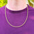 gold close curb chain on men's neck