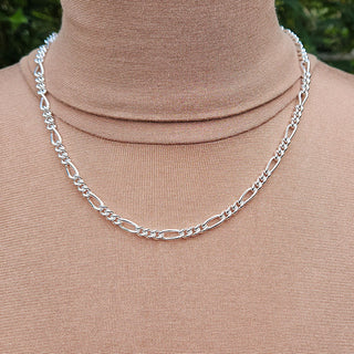 solid sterling silver figaro chain  being worn