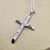 side view of large crucifix necklace in sterling silver