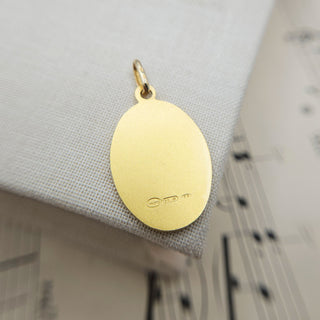 underside of small oval st christopher pendant