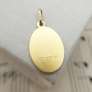 reverse side of medium gold st christopher