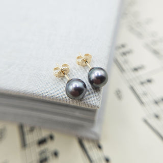 gold and black pearl studs