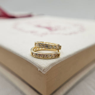 solid gold huggies with cubic zirconia stones