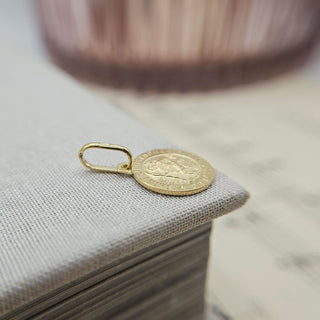 side profile of solid gold st christopher