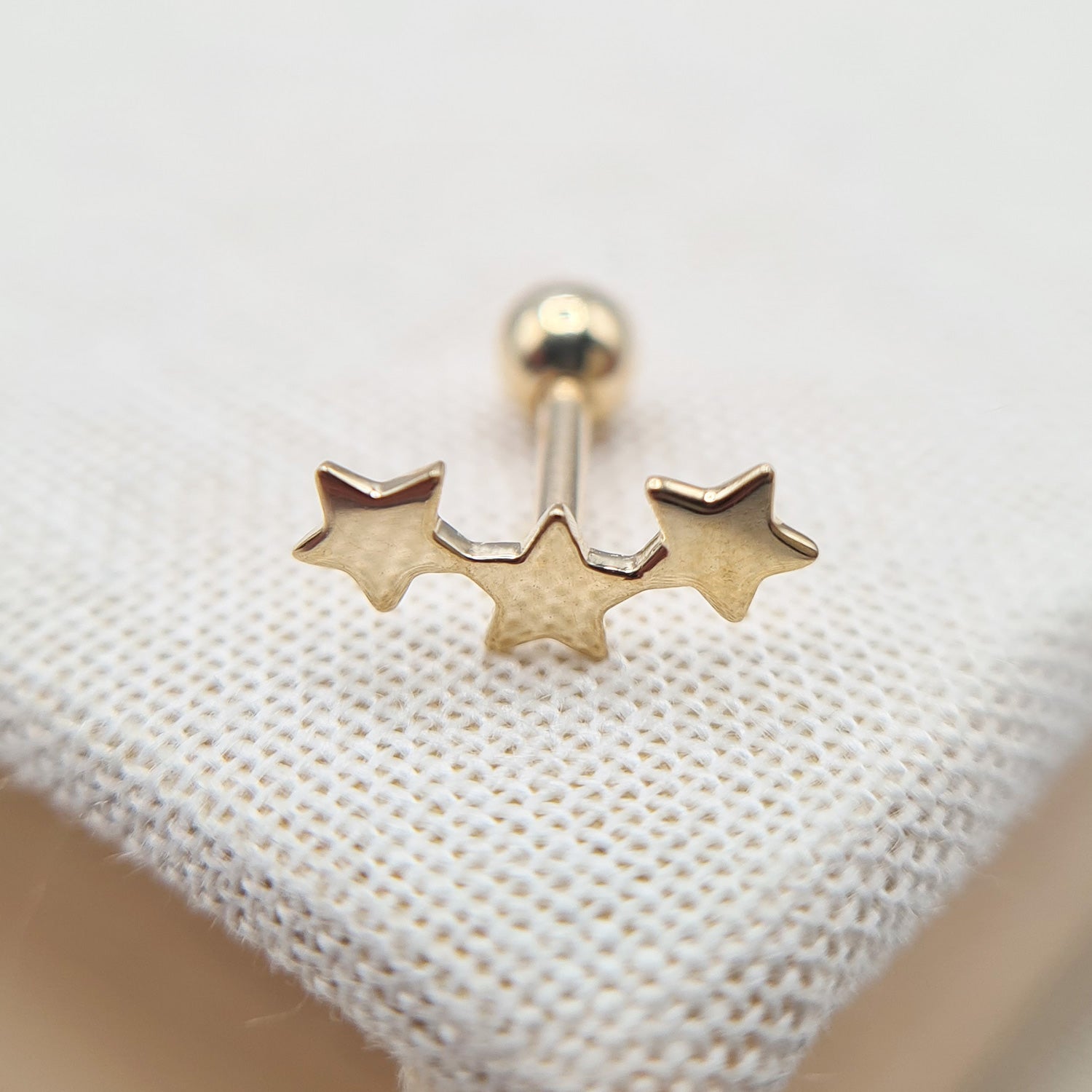 stars cartilage earring in gold