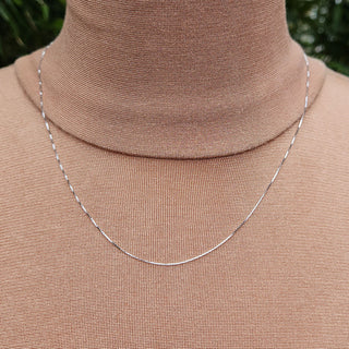 white gold box chain on neck