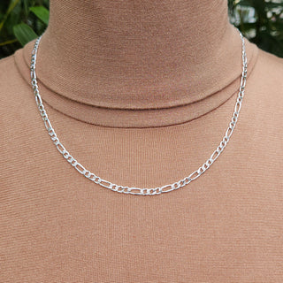 4mm silver figaro chain necklace being worn