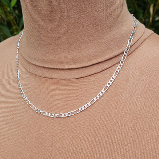 another view of silver figaro chain being worn