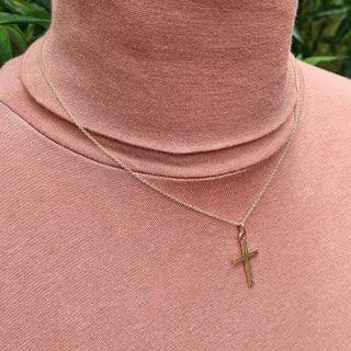 another view of gold cross necklace