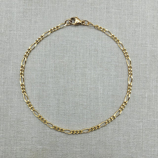 women's solid gold figaro bracelet