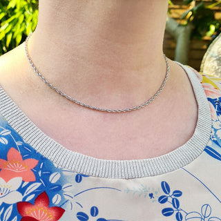 white gold prince of wales chain on women's neck