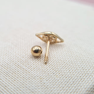 eye helix earring in gold