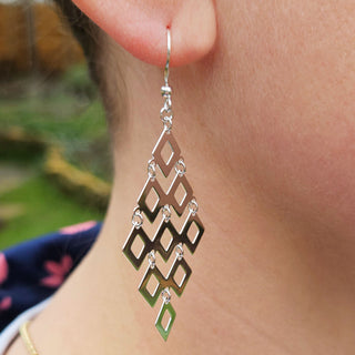 articulated dangle earrings in sterling silver