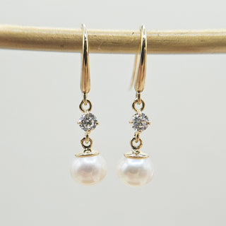 pearl dangle earrings in 9ct gold