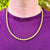 heavy gold rope chain on men's neck
