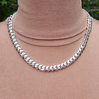 chunky silver cuban curb chain on neck