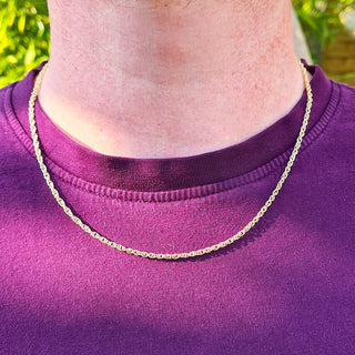 yellow gold prince of wales chain on men's neck