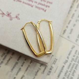 another view of quality rectangular earrings in gold