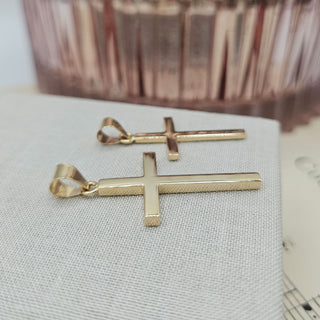 side profile of solid gold cross pendants