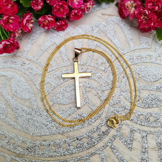 medium gold cross on curb chain