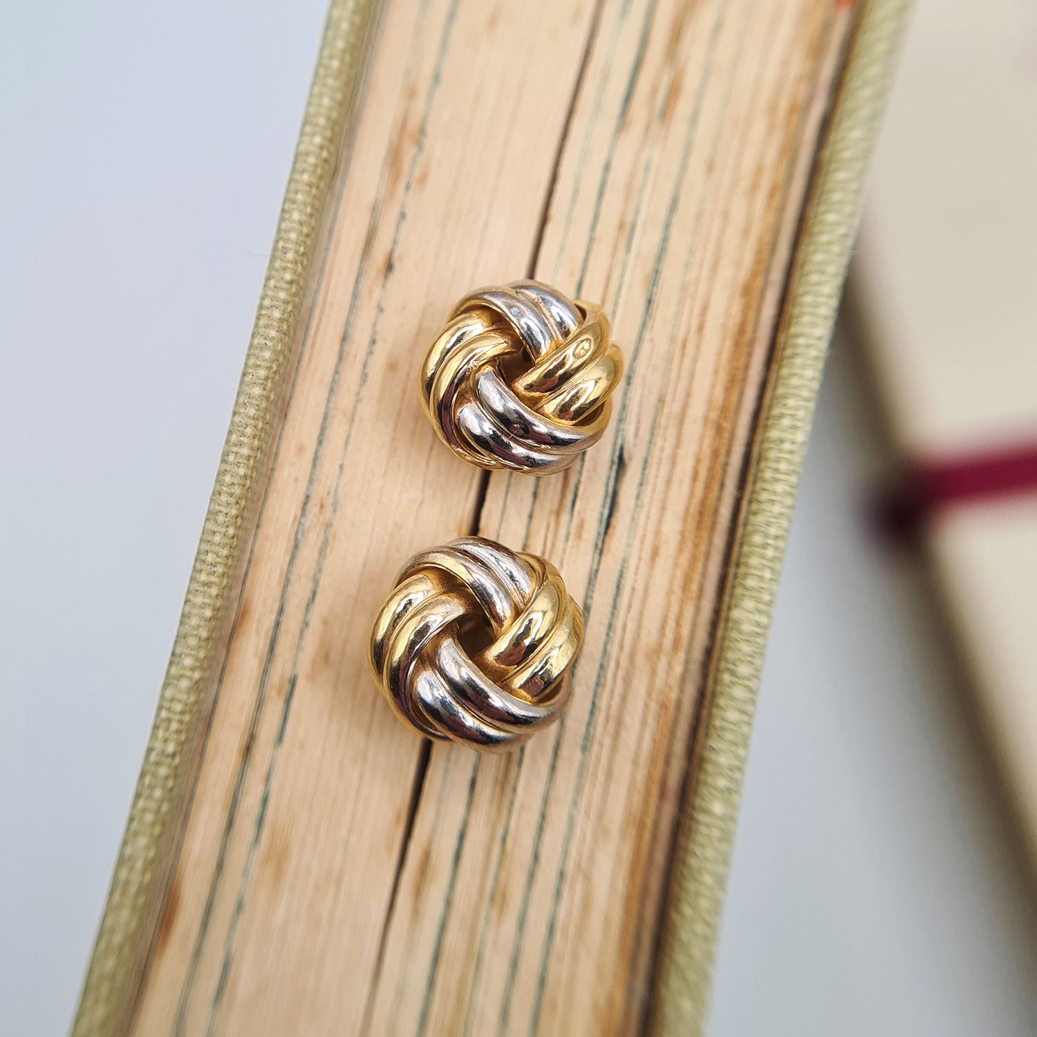 Silver and gold hot sale knot earrings