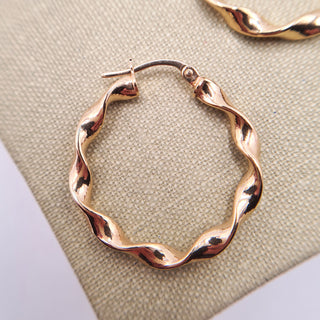 another view of gold hoop earrings 2.5cm wide