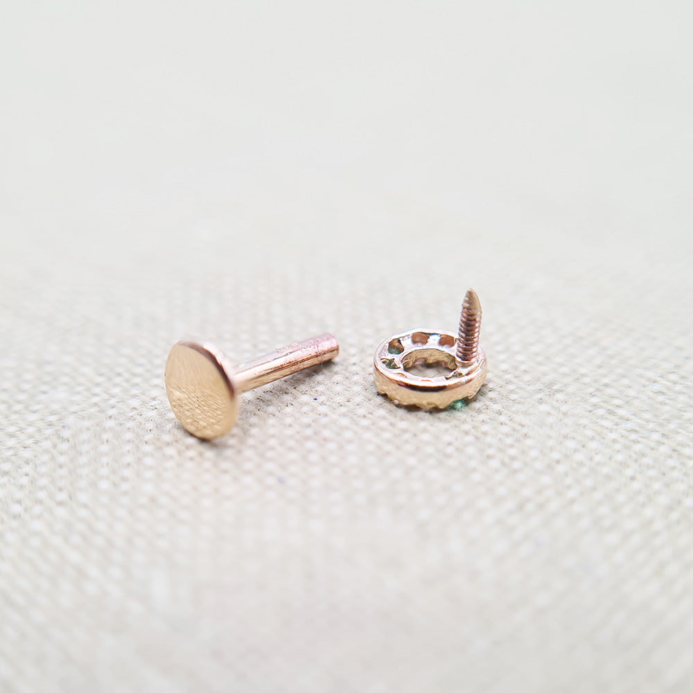 solid gold labret earring in a circle design