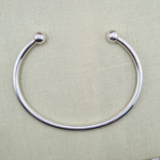 men's silver torque bangle with ball ends