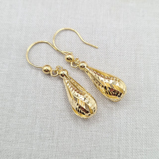 another view of the openwork gold drop earrings