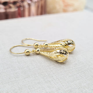 pretty gold dangle earrings