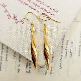 yellow gold twisted dangle earrings