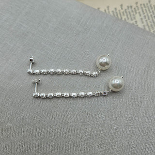 very long drop earrings with pearl and cubic zirconia