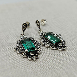 vintage style earrings with green gems