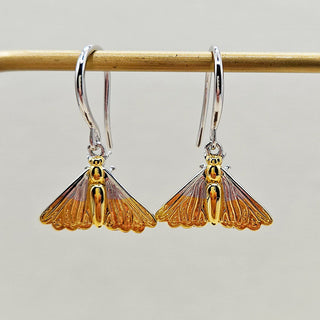 silver moth shaped drop earrings